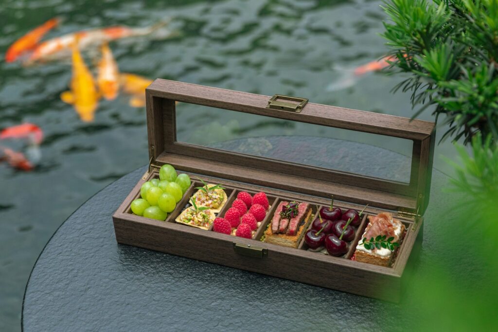 a wooden box filled with different types of food